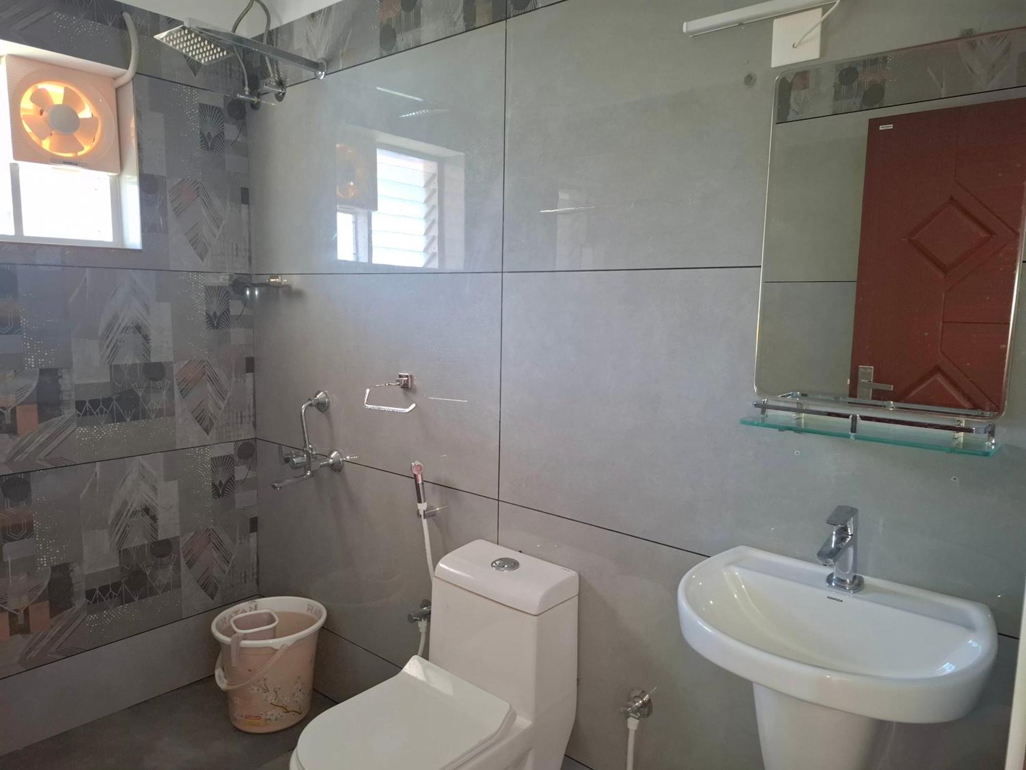 Seaside Homestay Thiruvananthapuram Værelse billede